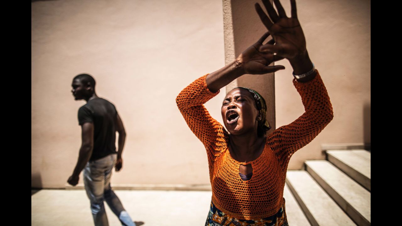A woman reacts outside the Libreville Magistrate Court in Libreville, Gabon, on Tuesday, September 6. <a href="http://www.cnn.com/2016/09/01/africa/gabon-election-protests/" target="_blank">Violence erupted in the country's capital</a> as protesters clashed with police after the announcement that incumbent President Al Bongo had won the presidential election. 