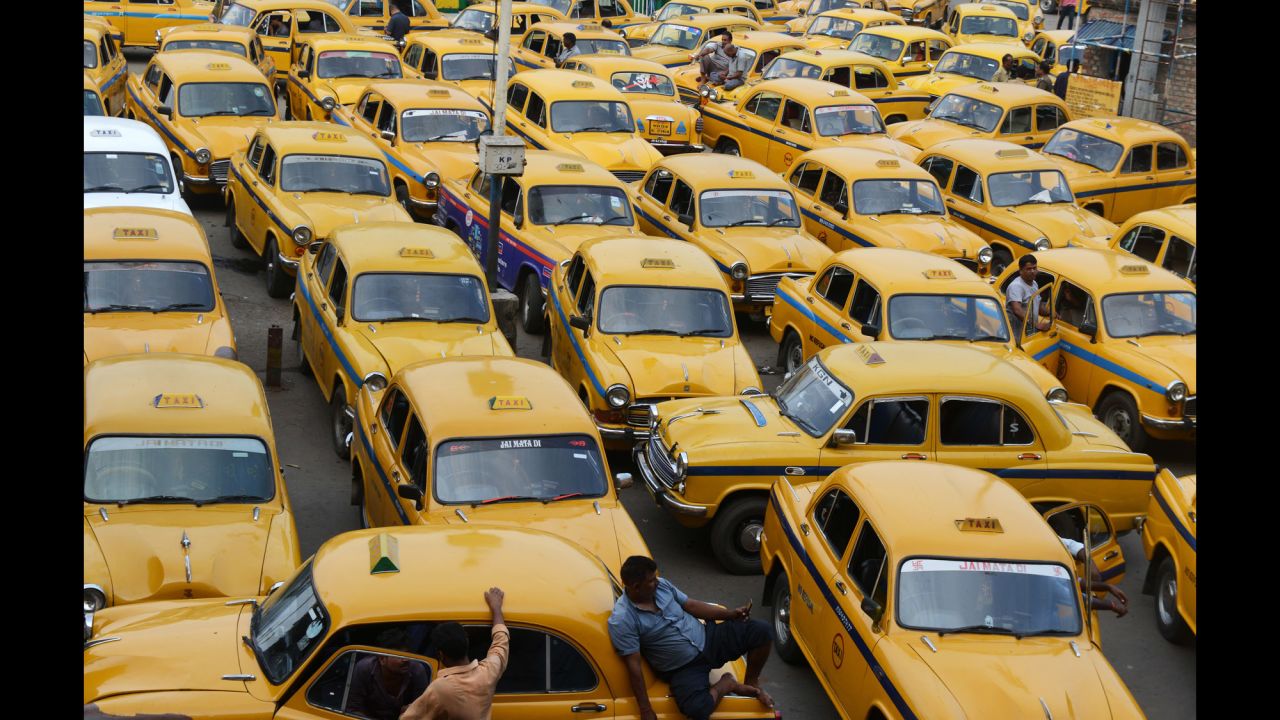 Taxi drivers wait for passengers outside a railway station in Kolkata, India, during a strike on Friday, September 2. <a href="http://www.aljazeera.com/news/2016/09/millions-indian-workers-strike-wages-160902131706206.html" target="_blank" target="_blank">According to Al Jazeera</a>, millions of public sector workers went on a daylong nationwide strike to protest Prime Minister Narendra Modi's economic plans.