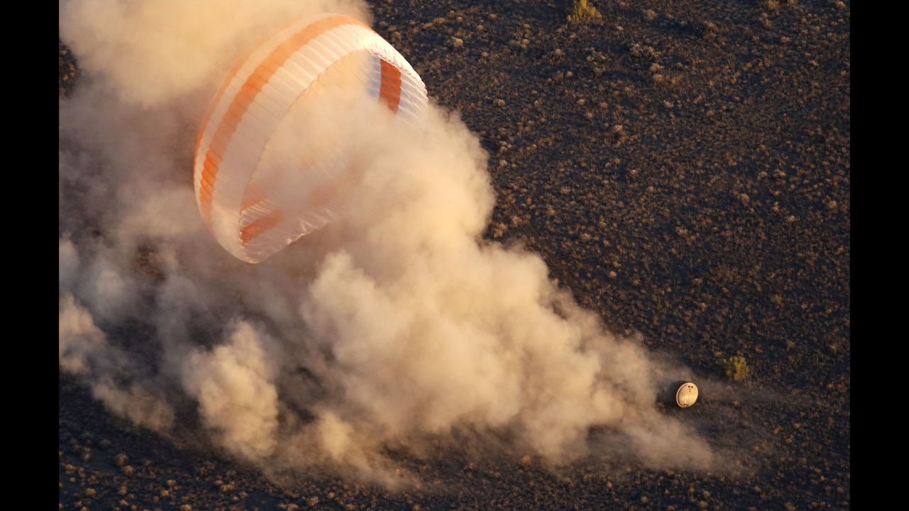 NASA astronaut Jeff Williams and Russian cosmonauts Alexey Ovchinin and Oleg Skripochka touch down near the town of Zhezkazgan, Kazakhstan, on Wednesday, September 7. The US-Russian crew -- carried to Earth by the Soyuz capsule -- landed safely after a six-month mission aboard the International Space Station.