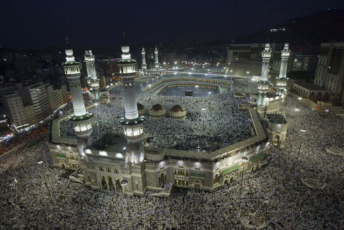 Muslim pilgrims attend the evening prayers inside the Grand Mosque in Mecca