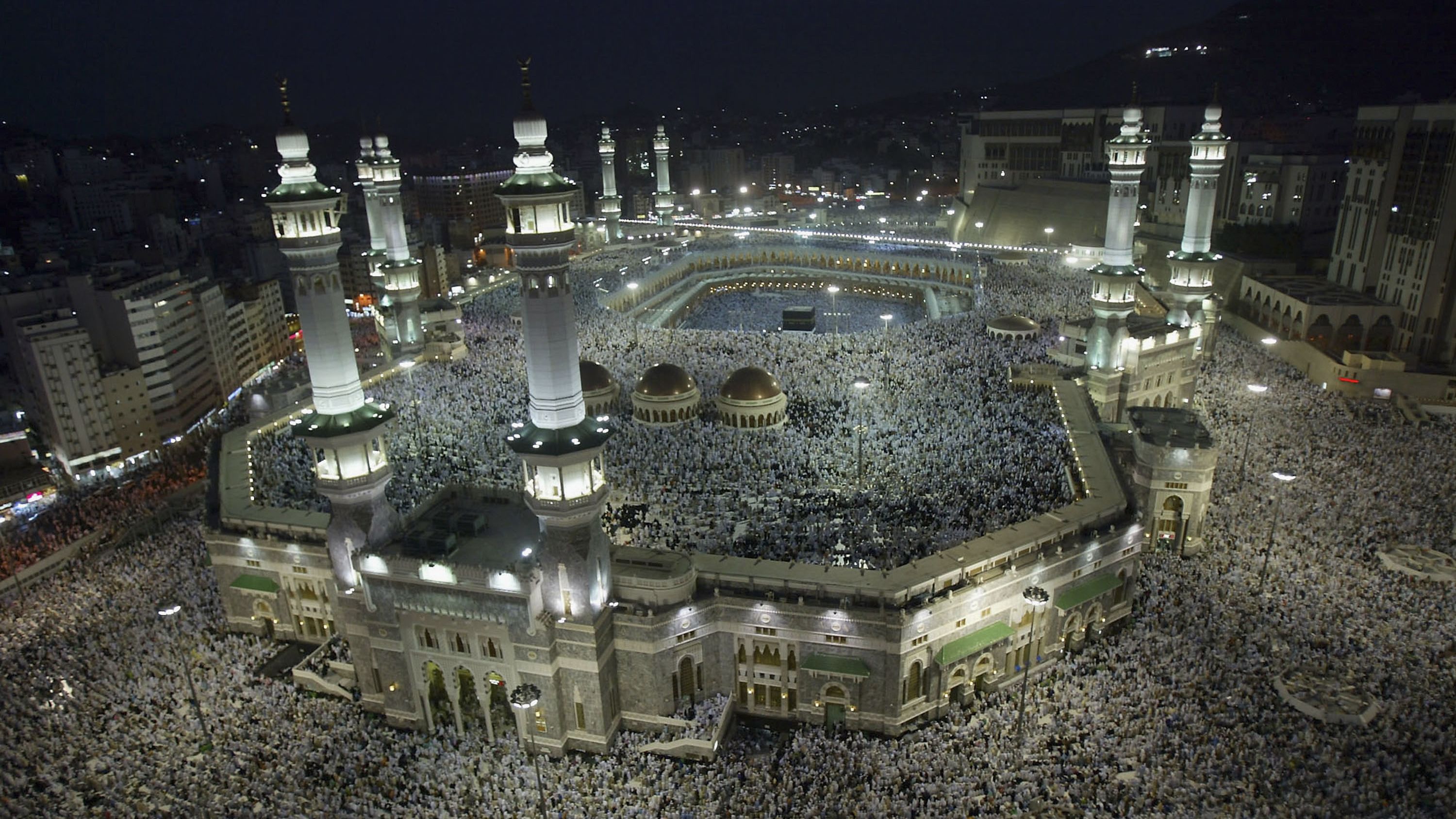 Muslim pilgrims attend the evening prayers inside the Grand Mosque in Mecca
