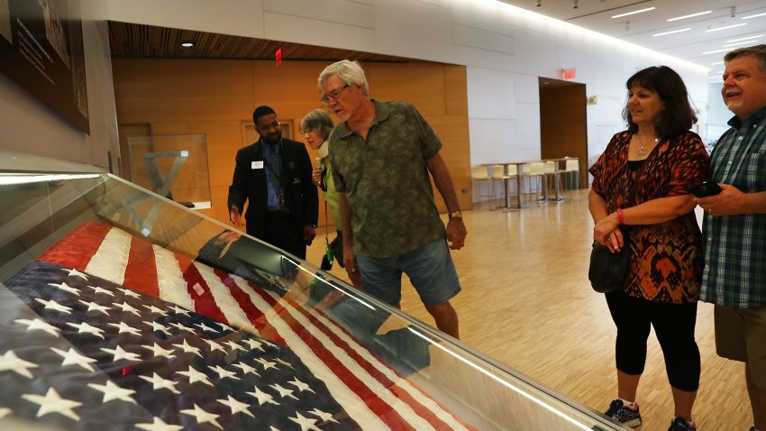 NEW YORK, NY - SEPTEMBER 08:  The American flag that was raised by firefighters above the site of the 9/11 attacks on the World Trade Center in New York on 2001 is displayed for the first time at the National September 11 Memorial & Museum after turning up in Washington state two years ago on September 8, 2016 in New York City. The flag was made iconic in a photo of firefighters raising it on the day of the attacks. The flag disappeared from Ground Zero during the site cleanup and was mysteriously turned into a police department by a man who gave his name only as "Brian". Sunday is the 15th anniversary of the terror attacks.  (Photo by Spencer Platt/Getty Images)