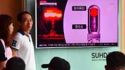 People watch a television news report on North Korea's latest nuclear test at a railway station in Seoul on September 9, 2016.
North Korea claimed September 9 it has successfully tested a nuclear warhead that could be mounted on a missile, drawing condemnation from the South over the "maniacal recklessness" of young ruler Kim Jong-Un. / AFP / JUNG YEON-JE        (Photo credit should read JUNG YEON-JE/AFP/Getty Images)