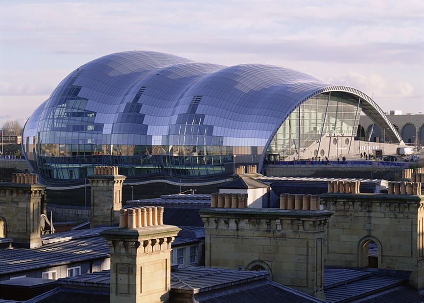 Designed by Foster + Partners, the Sage Gateshead contains three freestanding concerts halls. Joining them is a glass and steel shell-like canopy that is said to resemble the shape of a trumpeter's knuckles. It cost £46m ($61m) to build and opened in 2004 as part of the Gateshead Quays redevelopment that also saw the arrival of the BALTIC Centre for Contemporary Art and the Gateshead Millennium Bridge. At its peak, the Sage is twice the height of Anthony Gormley's Angel of the North sculpture. It was also constructed using a special type of concrete that contains extra air bubbles to help control its acoustics and provide sound-proofing.