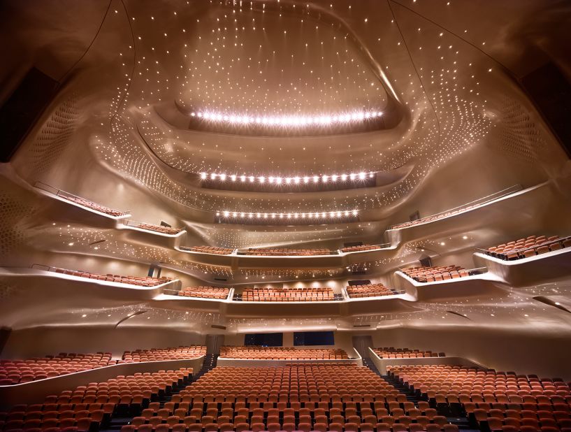 Built in 2010, China's riverside Guangzhou Opera House has the signature touch of the late Zaha Hadid. Its contoured profile was inspired by river valleys and the way they constantly change shape through the process of erosion. Constructed from 12,000 tons of steel, the Opera House includes an 1,800-seat and a 400-seat theatre, each of which are fitted with L-ACOUSTICS sound reinforcement systems, producing an acoustic character its chief sound engineer, Mr Zhou, describes as 'Not too dry and not too bright'.
