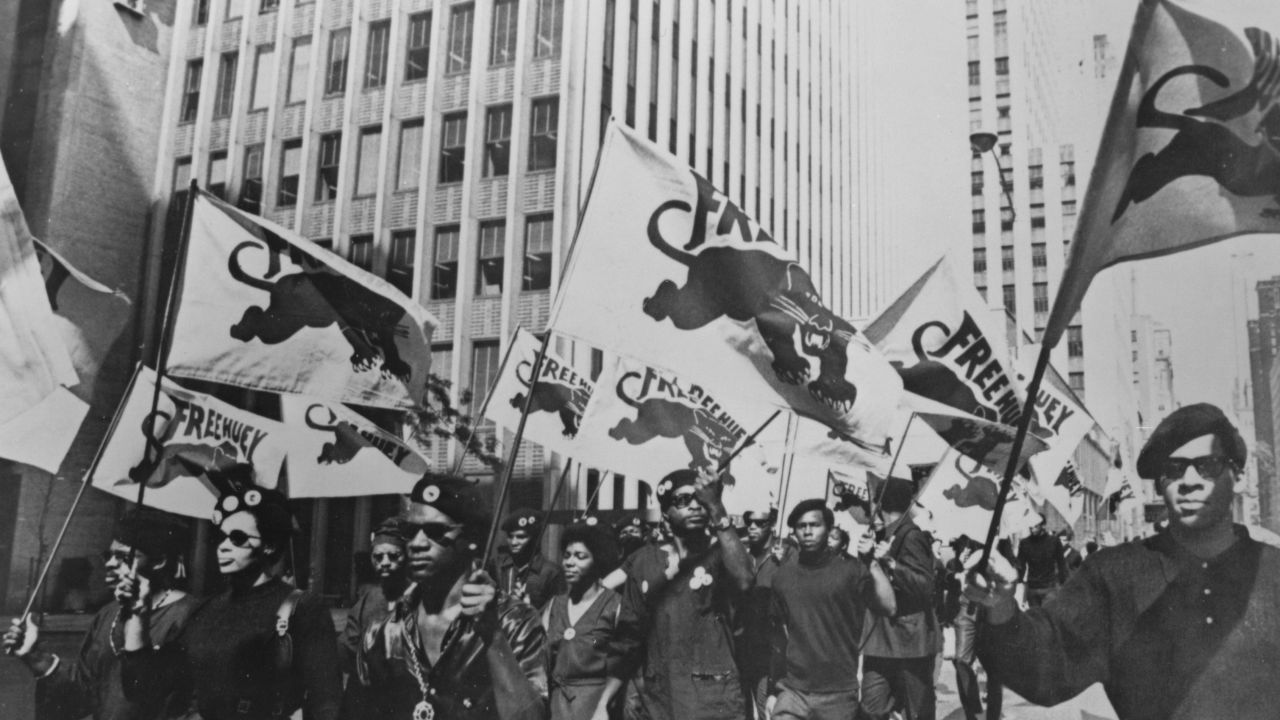 The Black Panther Party, seen here marchng in 1968, was shaped by Marxism and was dubbed 'socialist to the core.'