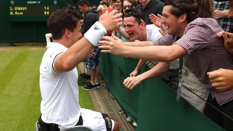 Friends and fans congratulate Gordon Reid after he clinched the Wimbledon title in July.