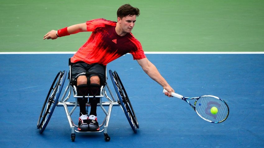 NEW YORK, NY - SEPTEMBER 10:  Gordon Reid of Great Britain returns a shot to Shingo Kunieda of Japan during their Men's Wheelchair Singles Quarterfinals matchon Day Eleven of the 2015 US Open at the USTA Billie Jean King National Tennis Center on September 10, 2015 in the Flushing neighborhood of the Queens borough of New York City.  (Photo by Alex Goodlett/Getty Images)