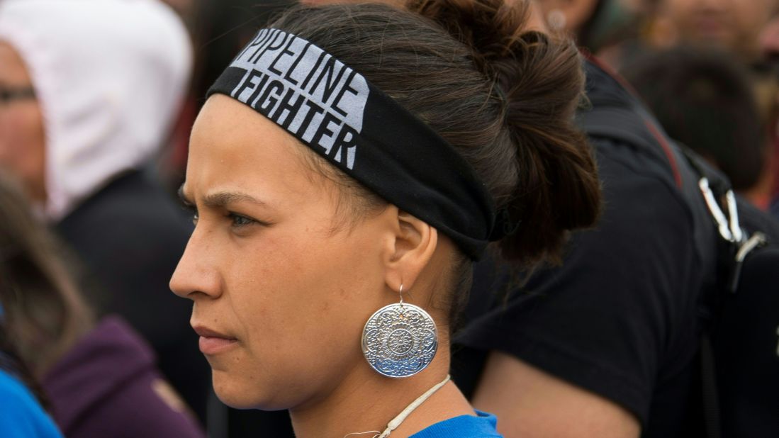 Marlo Langdeau of the Lower Brule Sioux Tribe joins hundreds of Native Americans for a march near Cannon Ball on Sunday, September 4.