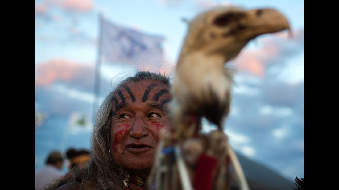 Phil Little Thunder Sr. attends an evening gathering at an encampment of Dakota Access Pipeline protesters on September 3.