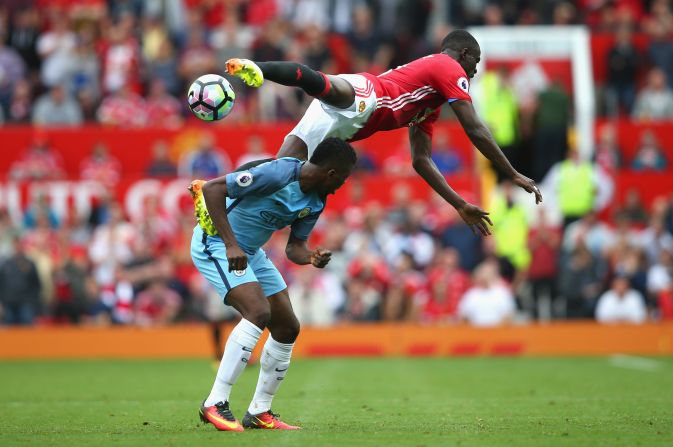  Kelechi Iheanacho of Manchester City and Eric Bailly of Manchester United battle for possession in the air during the Premier League match between Manchester United and Manchester City at Old Trafford on September 10, 2016 in Manchester, England.  