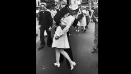 Glenn McDuffie kisses Greta Friedman in Times Square in New York on V-J Day, August 15, 1945.  (Original caption:  A jubilant American sailor clutching a white-uniformed nurse in a back-bending, passionate kiss as he vents his joy while thousands jam Times Square to celebrate the long awaited-victory over Japan.)