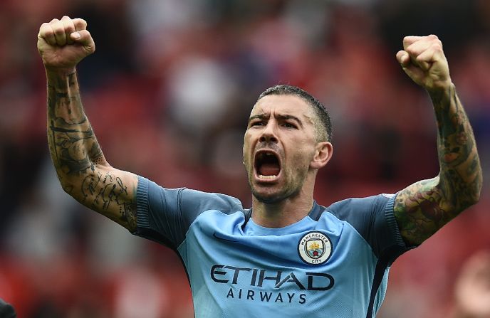 Manchester City's Serbian defender Aleksandar Kolarov celebrates on the pitch after the English Premier League football match between Manchester United and Manchester City at Old Trafford in Manchester, north west England, on September 10, 2016.