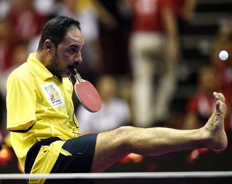  Ibrahim Hamato -- pictured at the 2016 World Team Table Tennis Championships -- came up with an ingenious way to continue playing table tennis after losing both his arms in an accident as a child.
