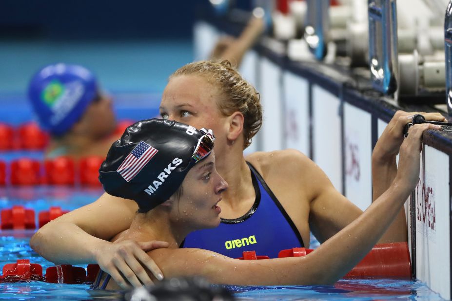 US Army Veteran Elizabeth Marks celebrates with teammate Jessica Long after winning gold in the SB7 100m breaststroke, smashing the world record in the process.