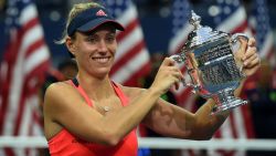 Angelique Kerber of Germany poses with her winning trophy after defeating Karolina Pliskova of Czech Republic in their 2016 US Open Womens Singles final match at the USTA Billie Jean King National Tennis Center in New York on September 10, 2016.
New world number one Angelique Kerber won the US Open title on Saturday with a battling 6-3, 4-6, 6-4 victory over Karolina Pliskova of the Czech Republic. / AFP / Timothy A. CLARY        (Photo credit should read TIMOTHY A. CLARY/AFP/Getty Images)