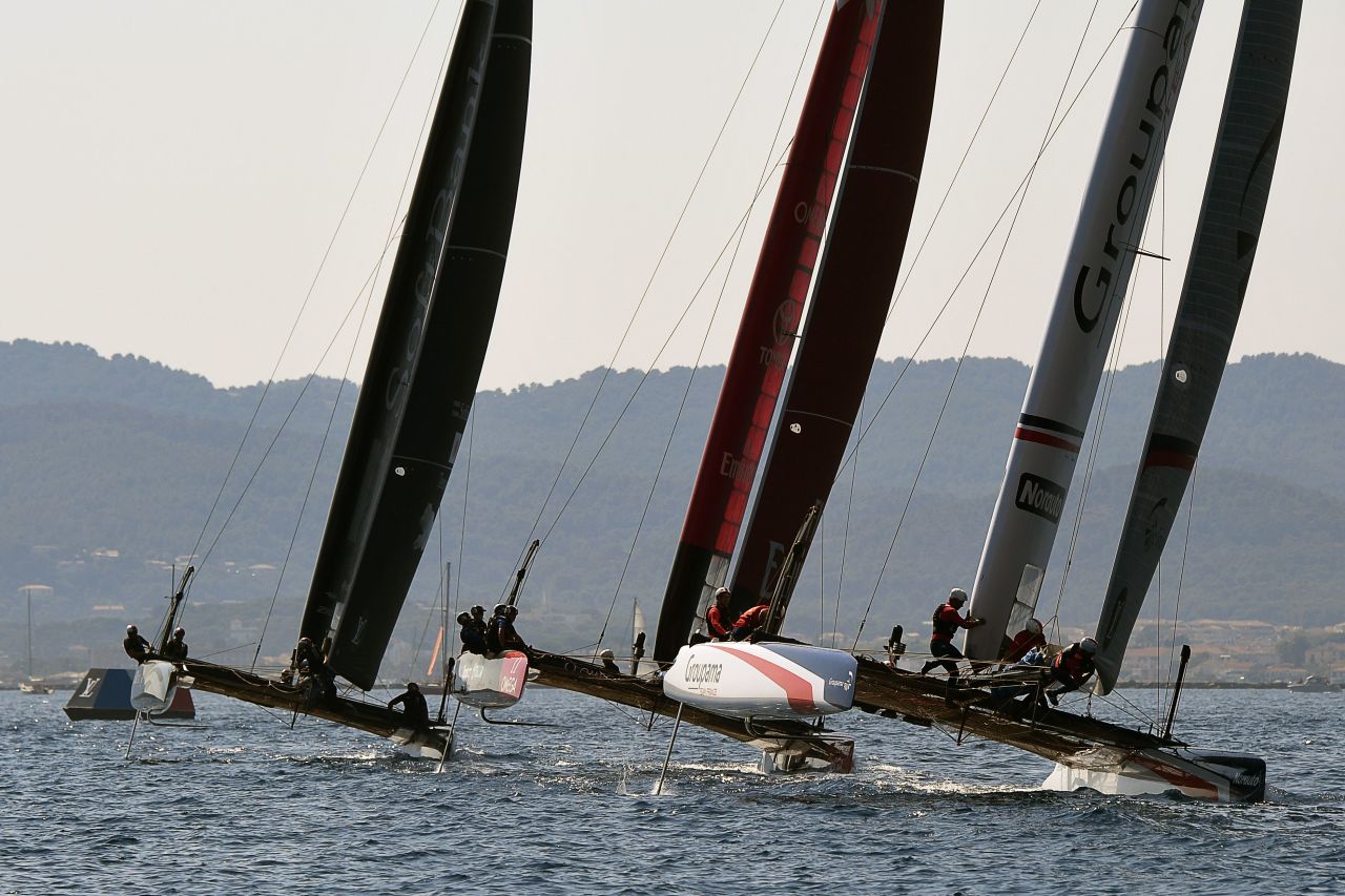 The Japan, New Zealand and French team multihulls battle for position on the second day of the Louis Vuitton America's Cup World Series. 