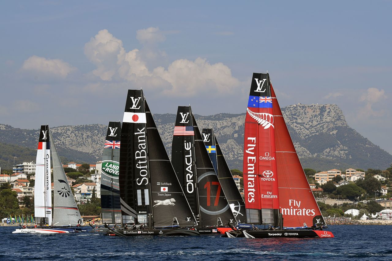 Multihulls France's Groupama, Great Britain's Land Rover, Japan's Softbank, USA's Oracle, Sweden's Artemis and New Zealand's Emirates sail on the first day of competition off Toulon.