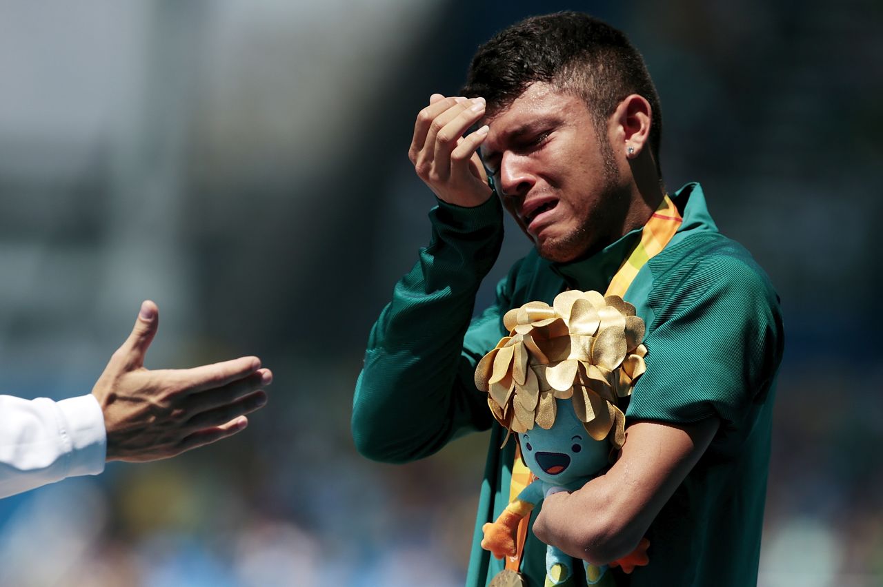 Ferreira dos Santos of Brazil couldn't contain his emotion during the national anthem after receiving his medal on the podium.