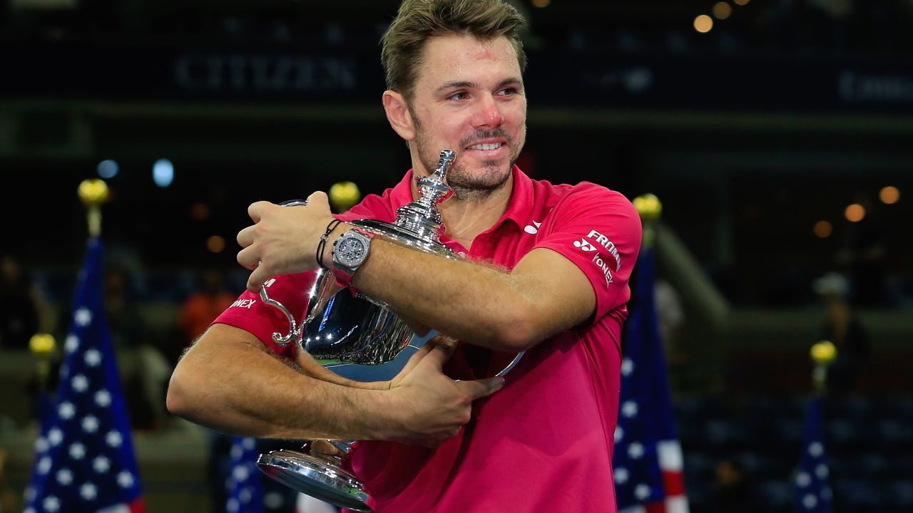 NEW YORK, NY - SEPTEMBER 11: Stan Wawrinka of Switzerland celebrates with the trophy after winning 6-7, 6-4, 7-5, 6-3 against Novak Djokovic of Serbia during their Men's Singles Final Match on Day Fourteen of the 2016 US Open at the USTA Billie Jean King National Tennis Center on September 11, 2016 in the Queens borough of New York City. (Photo by Chris Trotman/Getty Images for USTA)