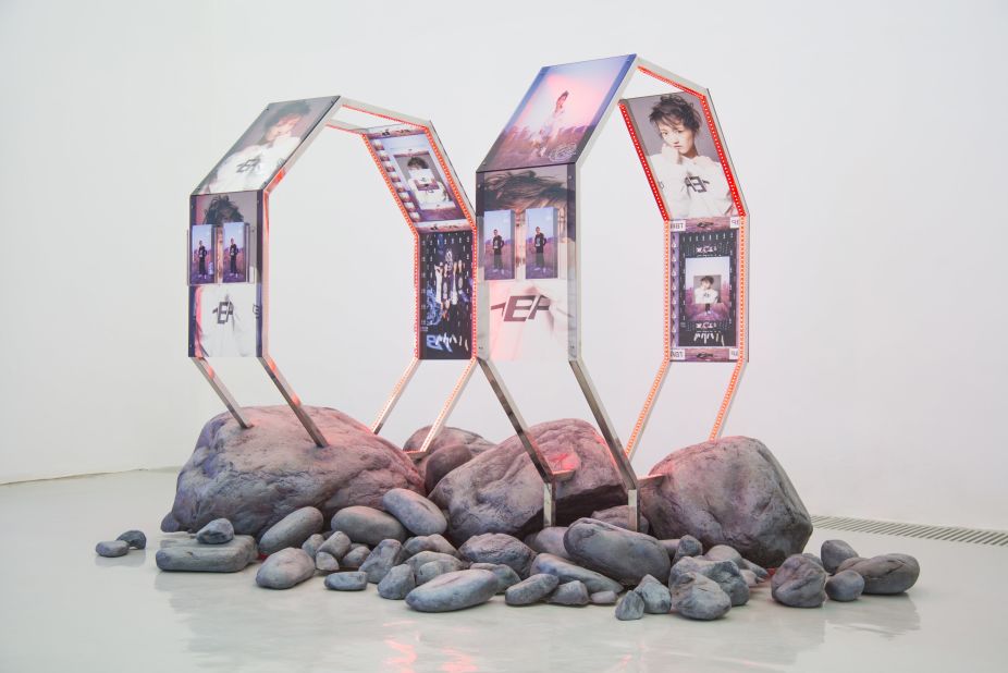 This striking installation by Timur Si-Qin compares K-Pop to geological process. The same way minerals are crushed and transformed into products, so too is contemporary Asian pop culture manufactured at an industrial rate -- an idea visualized by Si-Qin's mixture of sculpture and photography.