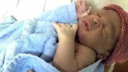 refugee baby born at sea soares pkg_00013515.jpg