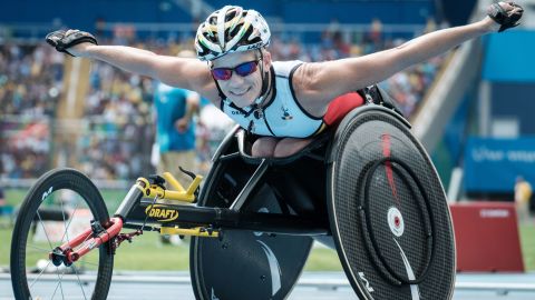 Belgium's Marieke Vervoort poses upon getting the silver medal for the women's 400 m (T52) of the Rio 2016 Paralympic Games at the Olympic Stadium in Rio de Janeiro on September 10, 2016. / AFP / YASUYOSHI CHIBA (Photo credit should read YASUYOSHI CHIBA/AFP/Getty Images)