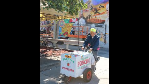 Fidencio Sanchez with his popsicle cart.