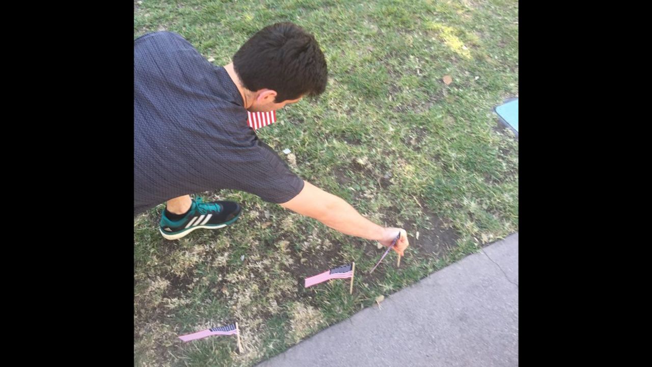 Putting the flags back up in the quad.
