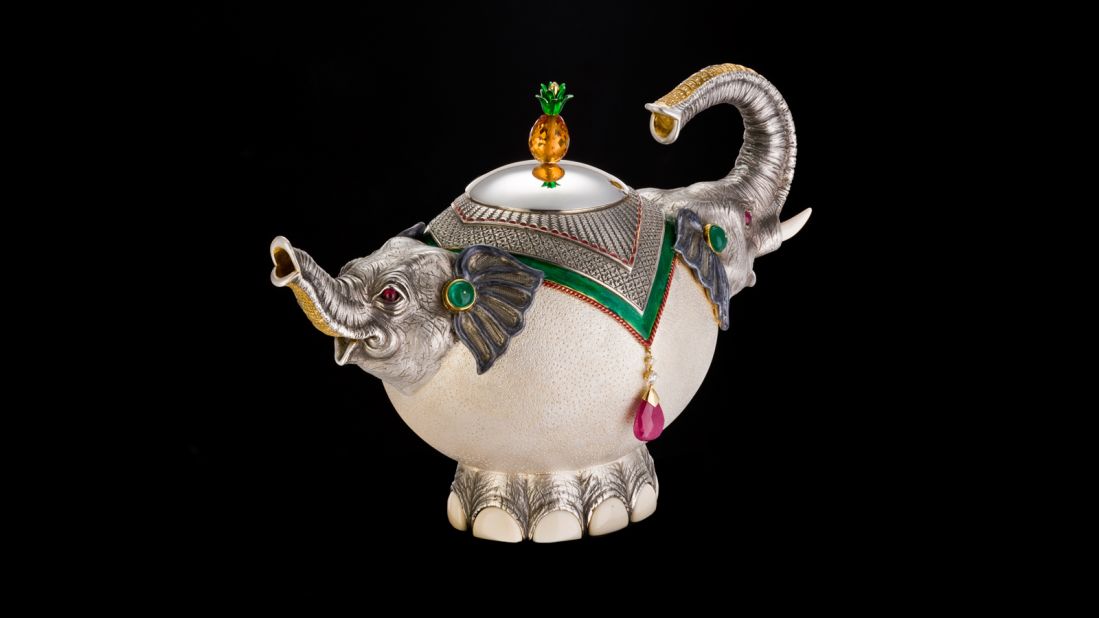 This teapot was specially commissioned by the Chitra Foundation. It incorporates emeralds, yellow diamonds, ruby, topaz and ivory.