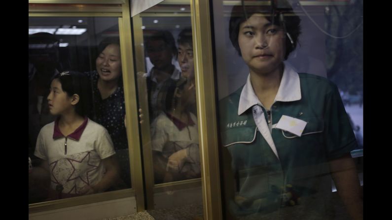 People play an arcade game at the Kaeson Youth Park in Pyongyang, North Korea. "I try to look for moments beneath the surface and all the orchestrated pageantry," said Maye-E Wong, lead Associated Press photographer for North Korea.