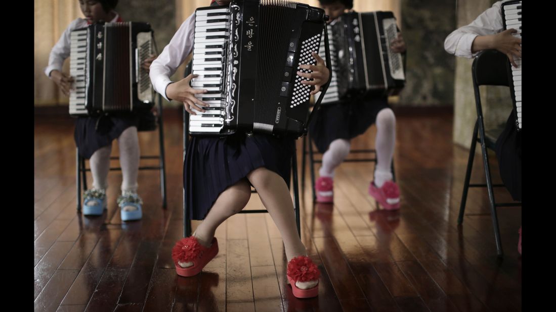 Schoolchildren perform a song during an accordion class. Wong is from Singapore and travels to North Korea about once a month for 10 days at a time, and works with Eric Talmadge, the AP's Pyongyang bureau chief and writer. They also work with a North Korean reporter and photographer.