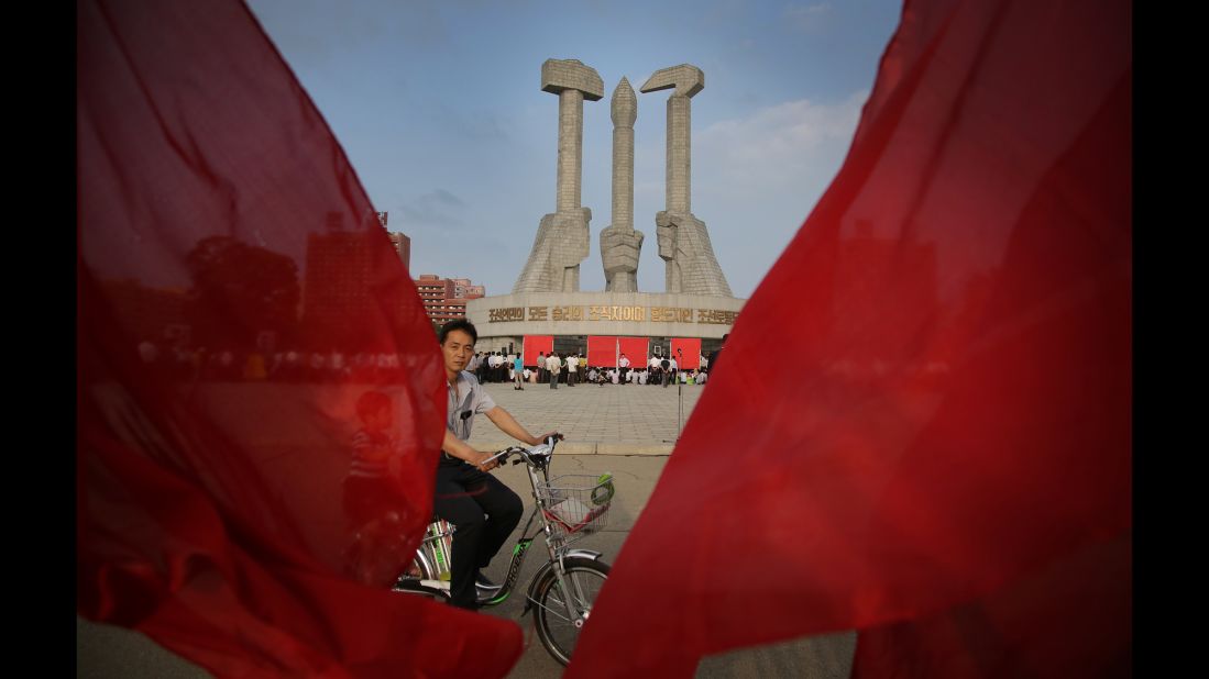 A man cycles past the Workers' Party monument. In January 2012, the AP opened its first bureau in the capital, Pyongyang, and today it is the only US-based media organization that has been allowed to maintain a constant presence in North Korea.