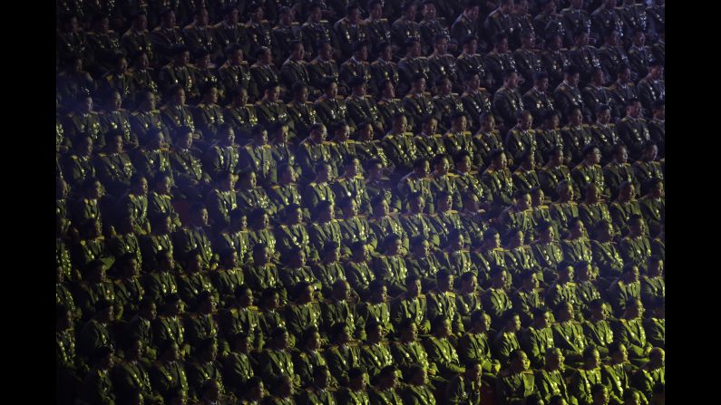 Military personnel attend a joint concert between the Moranbong Band and the State Merited Chorus during the 70th anniversary of the country's ruling party.