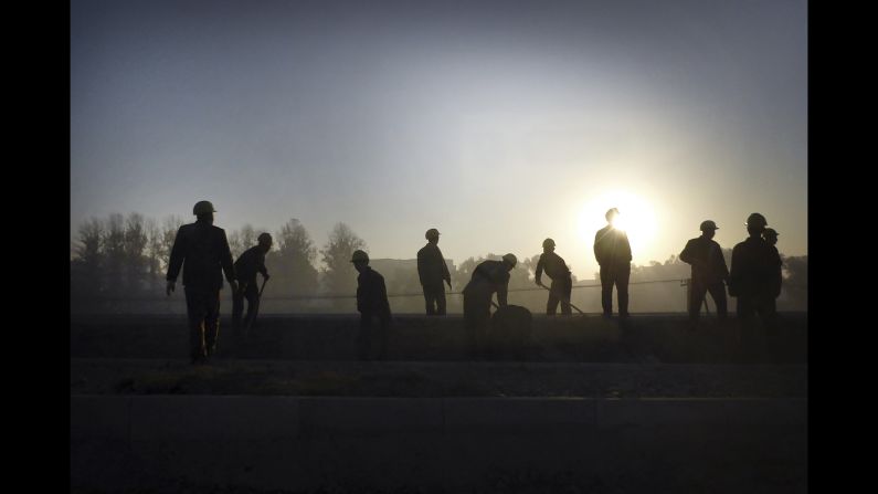 Soldiers build a structure at the Pyongyang Sunan International Airport.