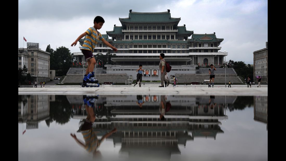 Children Rollerblade in Kim Il Sung Square. This is one of the first photographs Wong shot in North Korea. "It definitely was not a scene I expected to see out of North Korea, since I feel Rollerblading is a very Western pastime," she said.