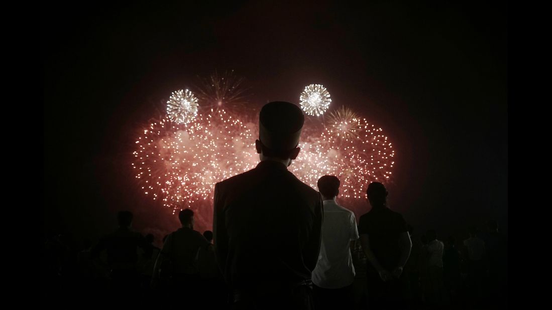 People watch fireworks during celebrations for the 62nd anniversary of the Korean War armistice.