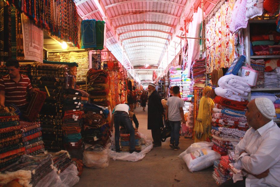 Rugs, spices, trinkets and food are all on sale at the bazaar in Kashgar.