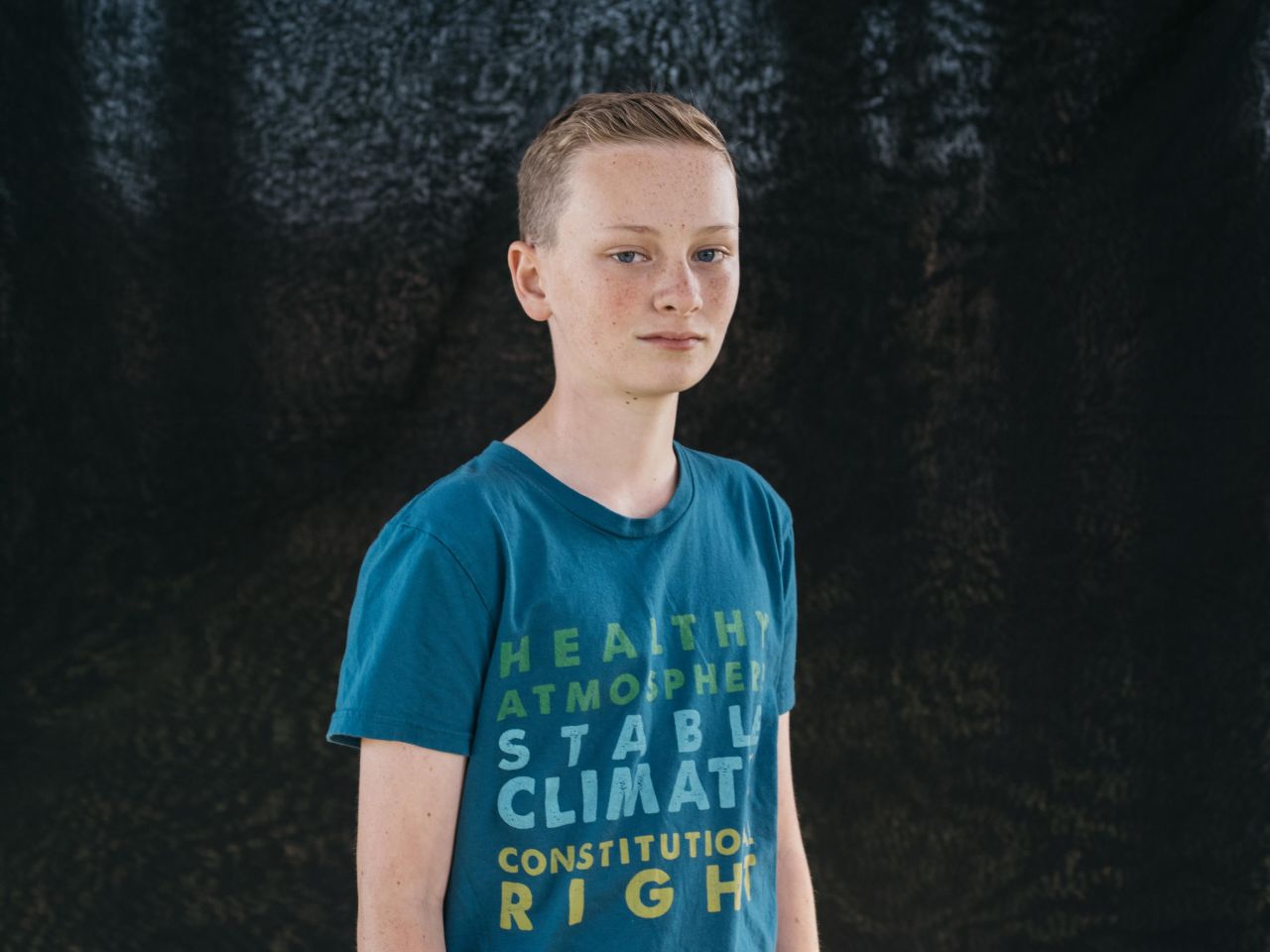 "I do a lot of outdoor activities that will be affected by climate change," said Zealand Bell, photographed at age 12, from Eugene, Oregon. "I ski, raft, hike -- all sorts of stuff. We go up to Willamette Pass (to ski), and the last few years it's barely been open because of the lack of snow. It does sort of make me mad, but mostly I'm sad. We've affected our climate so much. We've done all of this." 