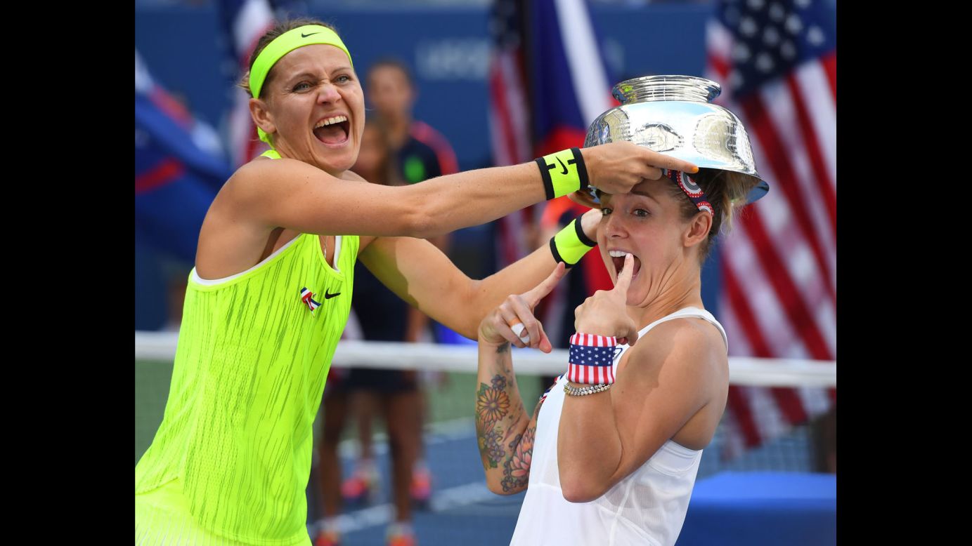 Lucie Safarova, left, and Bethanie Mattek-Sands celebrate after beating Caroline Garcia and Kristina Mladenovic in the US Open doubles final in New York on Sunday, September 11.