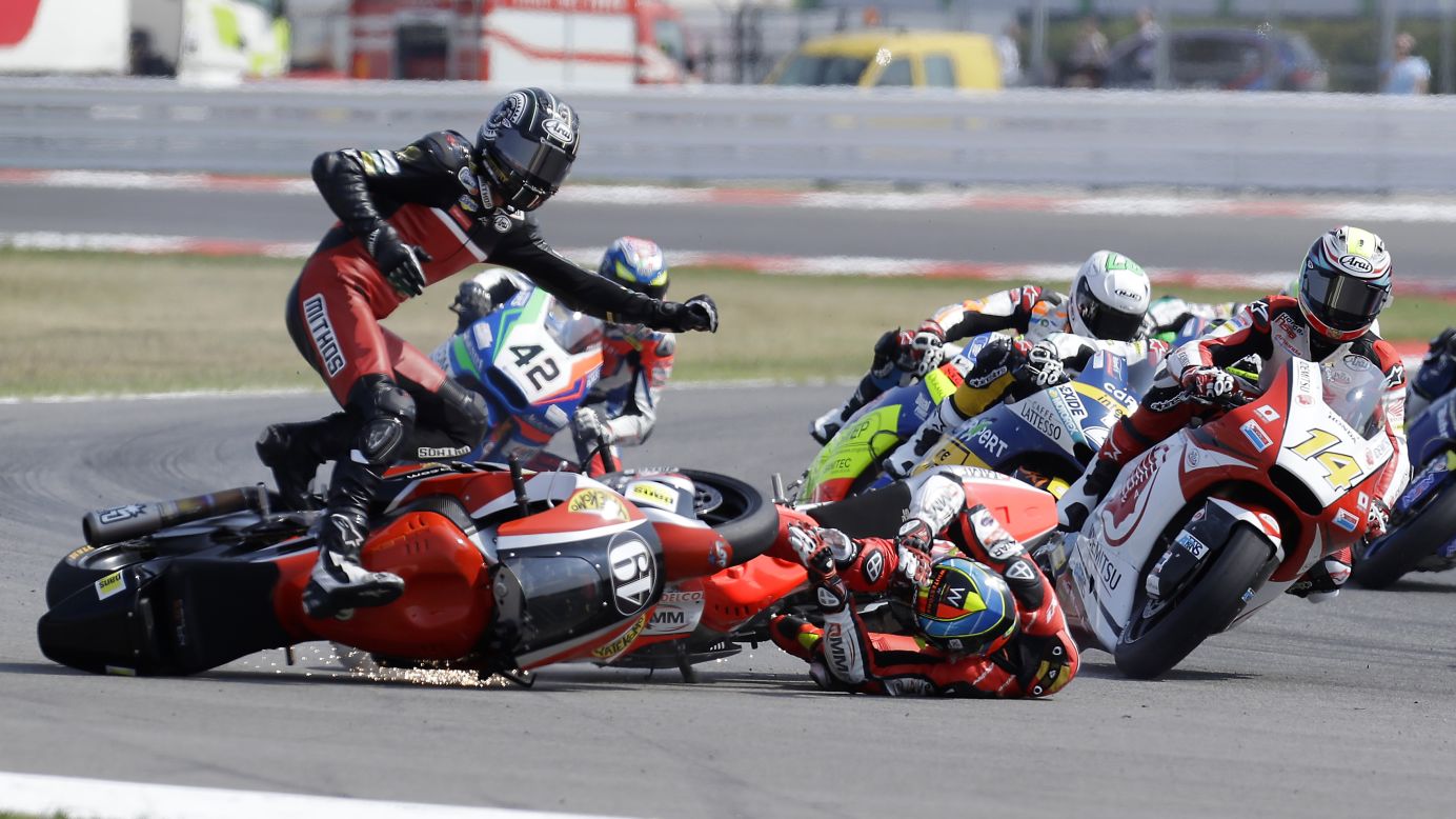 Axel Pons, left, and Xavier Simeon, center, crash on the opening lap of the San Marino Grand Prix in Misano Adriatico, Italy, on Sunday, September 11. 