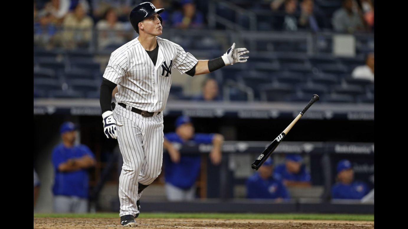 Tyler Austin of the New York Yankees drops his bat after hitting a two-run home run during a game against Toronto in New York on Tuesday, September  6. The Yankees, who have had a difficult start to the season, beat Toronto 7-6.