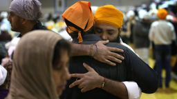 OAK CREEK, WI - AUGUST 10:  Family and friends gather at Oak Creek High School to mourn the loss of  6 members of the Sikh Temple of Wisconsin on August 10, 2012 in Oak Creek, Wisconsin. Bhai Seeta Singh, Bhai Parkash Singh, Bhai Ranjit Singh, Satwant Singh Kaleka, Subegh Singh, and Parmjit Kaur Toor were killed when Wade Michael Page, a suspected white supremacist, went on a shooting rampage at the temple August 5. Page also died at the temple after being shot by police then shooting himself.  (Photo by Scott Olson/Getty Images)