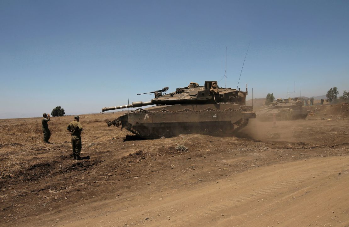 An Israeli tank in the Golan Heights near the Quneitra crossing with Syria in July.