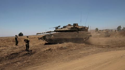 An Israeli tank in the Golan Heights near the Quneitra crossing with Syria in July.