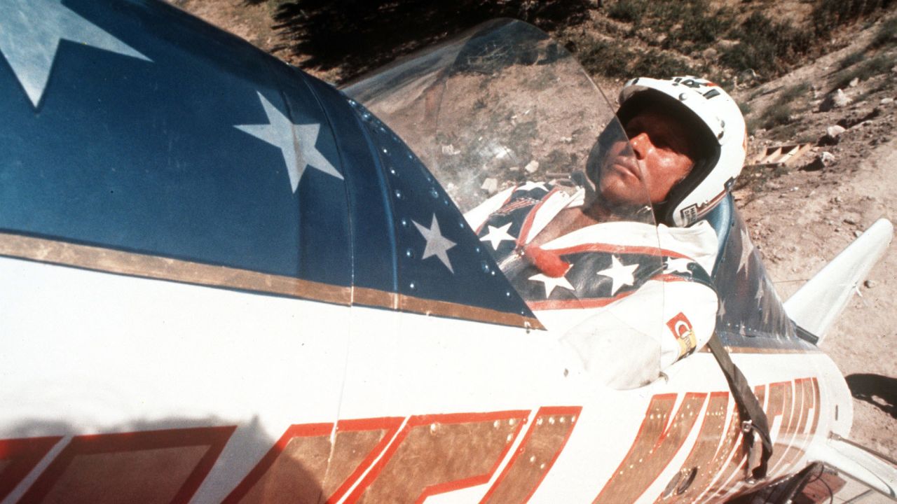Evel Knievel sits in his steam-powered "rocket cycle" before his September 8, 1974, attempt to jump the Snake River Canyon near Twin Falls, Idaho. (Note his lucky rabbit's foot.) Forty-two years later, Hollywood stuntman Eddie Braun plans to try the same jump, in a replica of Knievel's aircraft, to honor his daredevil hero.