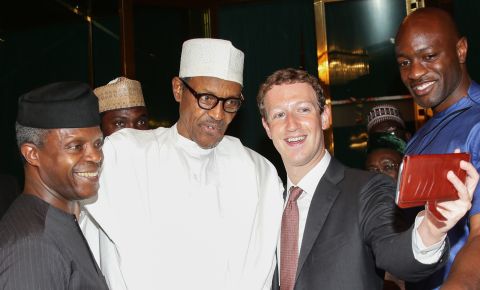Pictured: Nigerian President Muhammadu Buhari (C) and Vice President Yemi Osinbajo (L) pose as Facebook founder Mark Zuckerberg (2nd R) takes a selfie picture with them, during a visit to the presidential palace in Abuja, Nigeria, on September 2, 2016.
