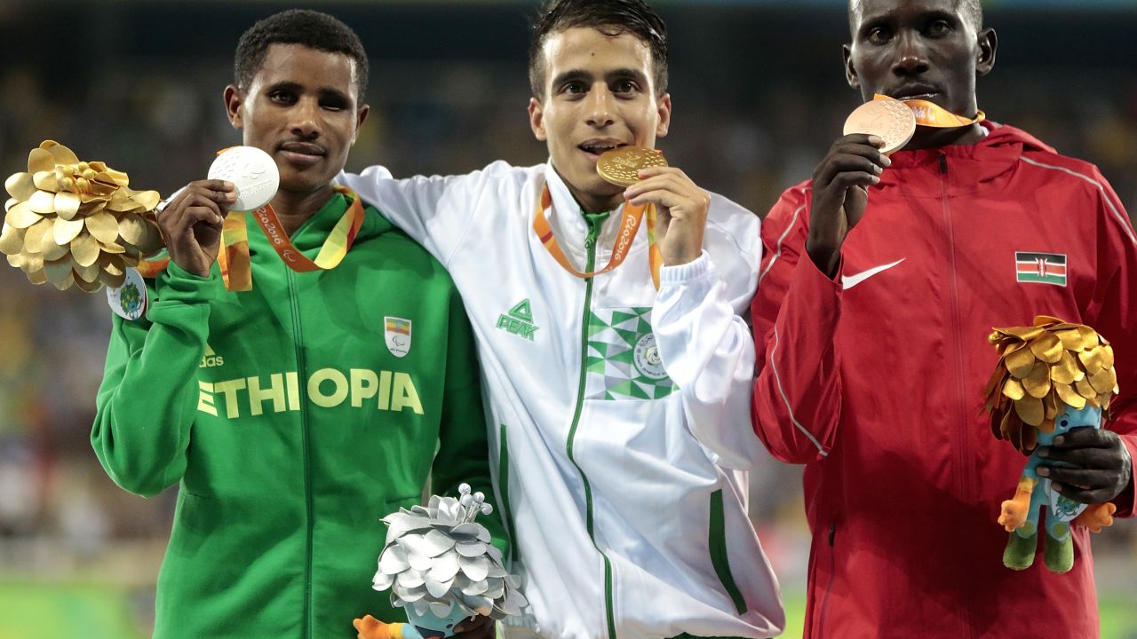 Abdellatif Baka (center) won gold from Tamiru Demisse (left) and third-placed Henry Kirwa.