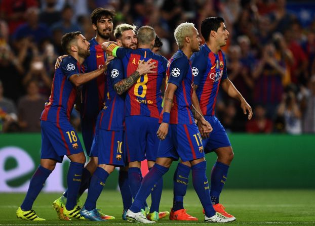 Lionel Messi celebrates one of his three goals as Barcelona recorded its largest Champions League victory when thrashing Celtic 7-0 at Camp Nou. 
