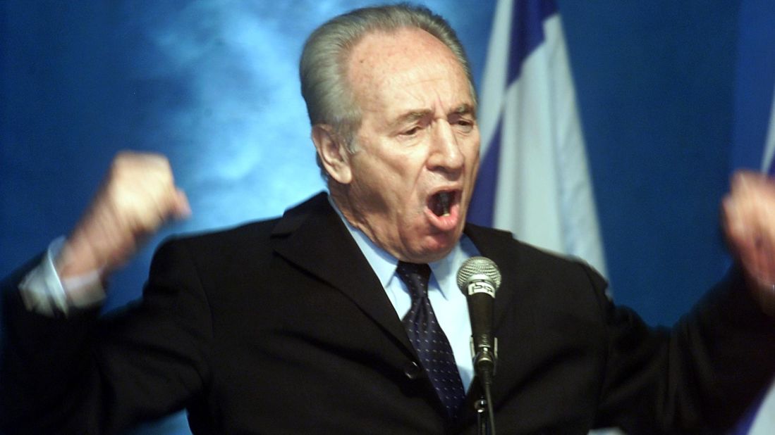Former Israeli prime minister Shimon Peres makes a passionate plea for the Labor party to join a national unity government with the Likud party during a meeting of the party's central committee in Tel Aviv  February 26, 2001. Peres' leadership spans decades, and generations. He retired from public office in 2014 after the end of his seven-year term as President.